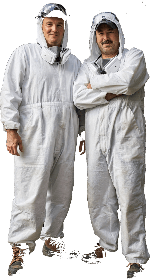 The two Guelph Balcony Brothers standing confidently in protective suits, respirators around their necks